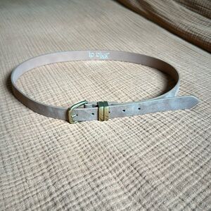 Thin brown belt with gold buckle